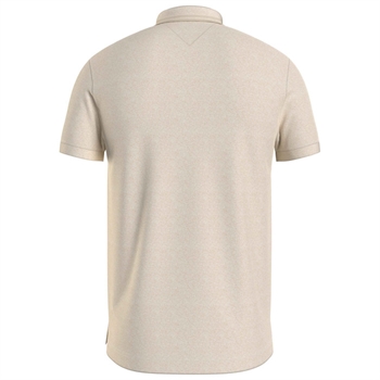 Lækker beige mouline polo fra Tommy Hilfiger.