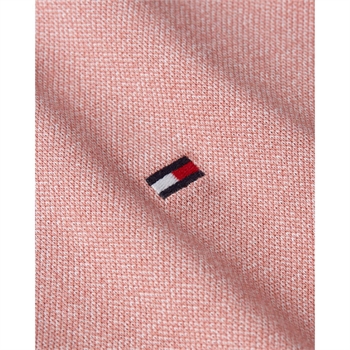 Smart lyserød mouline polo fra Tommy Hilfiger.