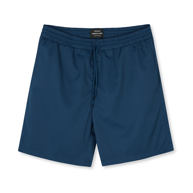 Navy blå badeshorts fra Mads Nørgaard.